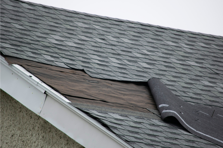 Wind Blown Damaged Shingles needing immediate repair