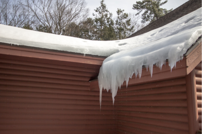 ice dams, that could be prevented by gutter guards installed by Northland Roofing LLC